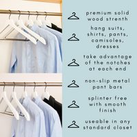 white shirts hung on a modern white wooden hangers with black chrome non slip pant bar and black chrome 360 degree hook, minimalist capsule wardrobe design with white hangers with black chrome hardware.
