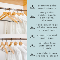 white shirts hung on a modern natural wooden hangers with black chrome non slip pant bar and black chrome 360 degree hook, minimalist capsule wardrobe design with natural hangers with black chrome hardware.